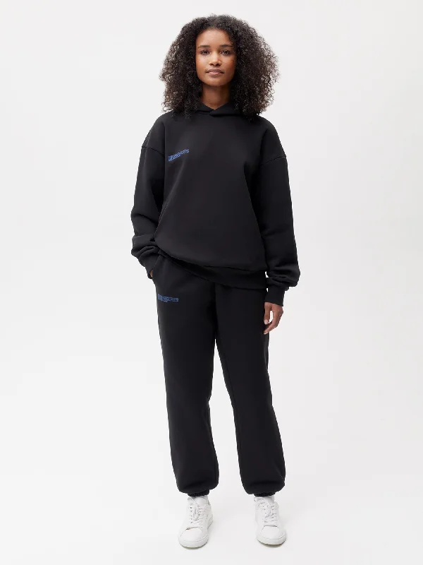 In Conversion Cotton Track Pants—black