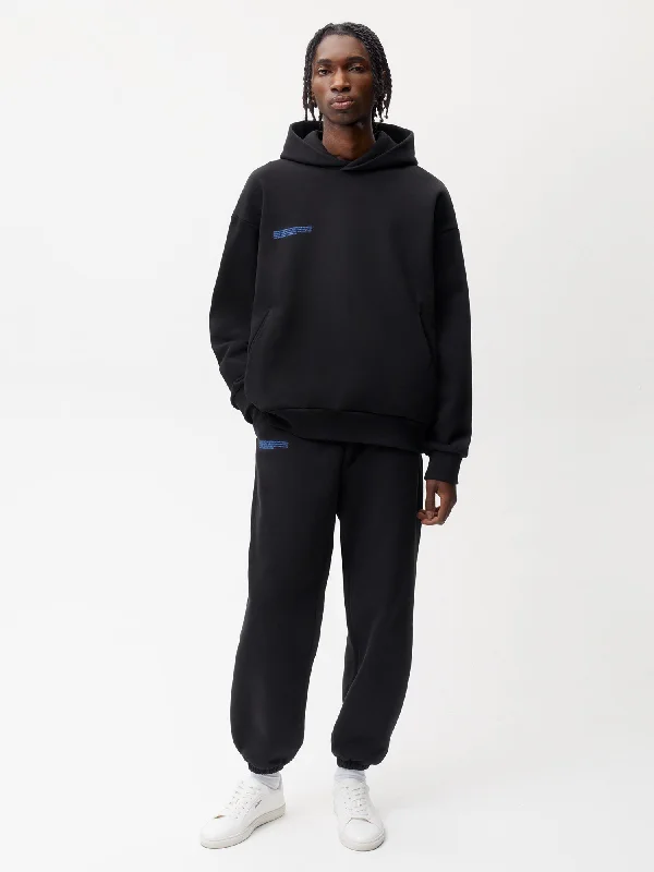 In Conversion Cotton Track Pants—black